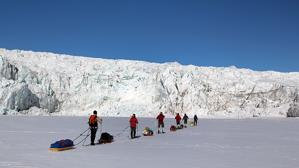 Skitrip in front of a glacier in Svalbard