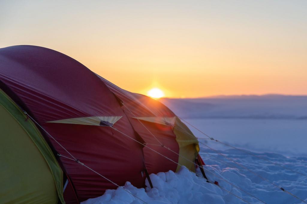 Tenting in the arctic with midnight sun
